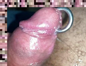 After a little pumping and hours of edging a little pre cum in a pierced cock