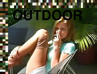 Leggy teen with stockings smokes so hot