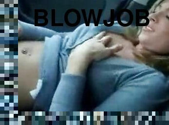 Blonde girl blowing her man in car