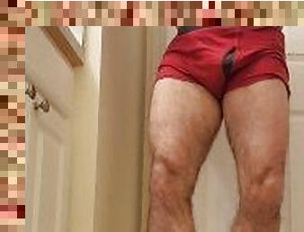 Hairy muscle bear flexing in red boxer briefs