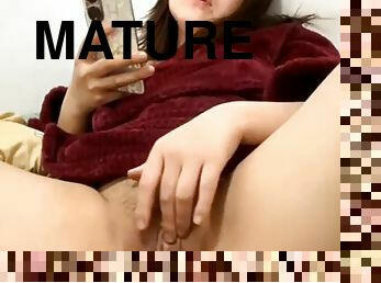 Mature masturbating