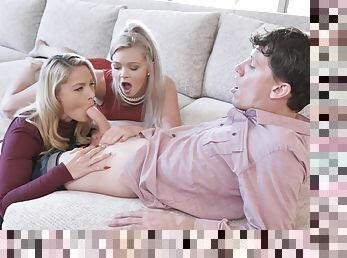 Hot females share cock in restless couch threesome