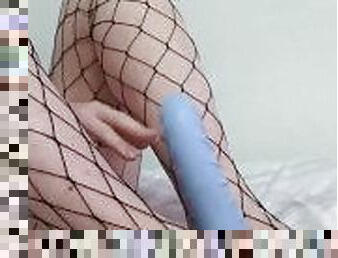 footjob with my dildo, while wearing fishnet stockings