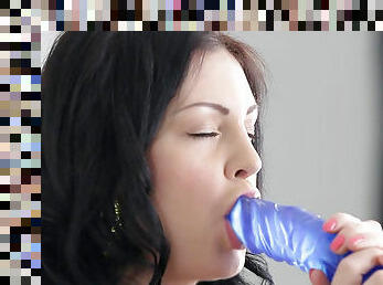 Brunette Alice Lee is sucking her sexy blue dildo