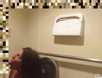 Brunette skank takes it from behind in public toilet