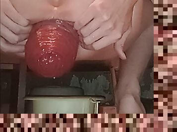 A young guy squatting, pushing and squeezing out a sweetly gigantic anal prolapse in his bathtub while no one is watch