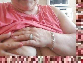 Bbw mature mommy shows her naked boobs.