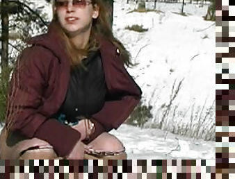 Skirt girl pissing in the snow