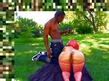 Fat ass black chick outdoors