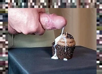 Huge cumshot on a delicious chocolate cupcake
