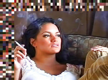 Busty brunette in smoking scene