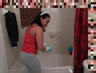 Spandex pants cling to her big ass as she cleans