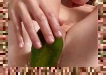 Sabrina fucking a cucumber