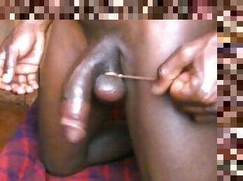 AFRICAN BLACK BIG DICK BONDAGE...tying the balls with a rope
